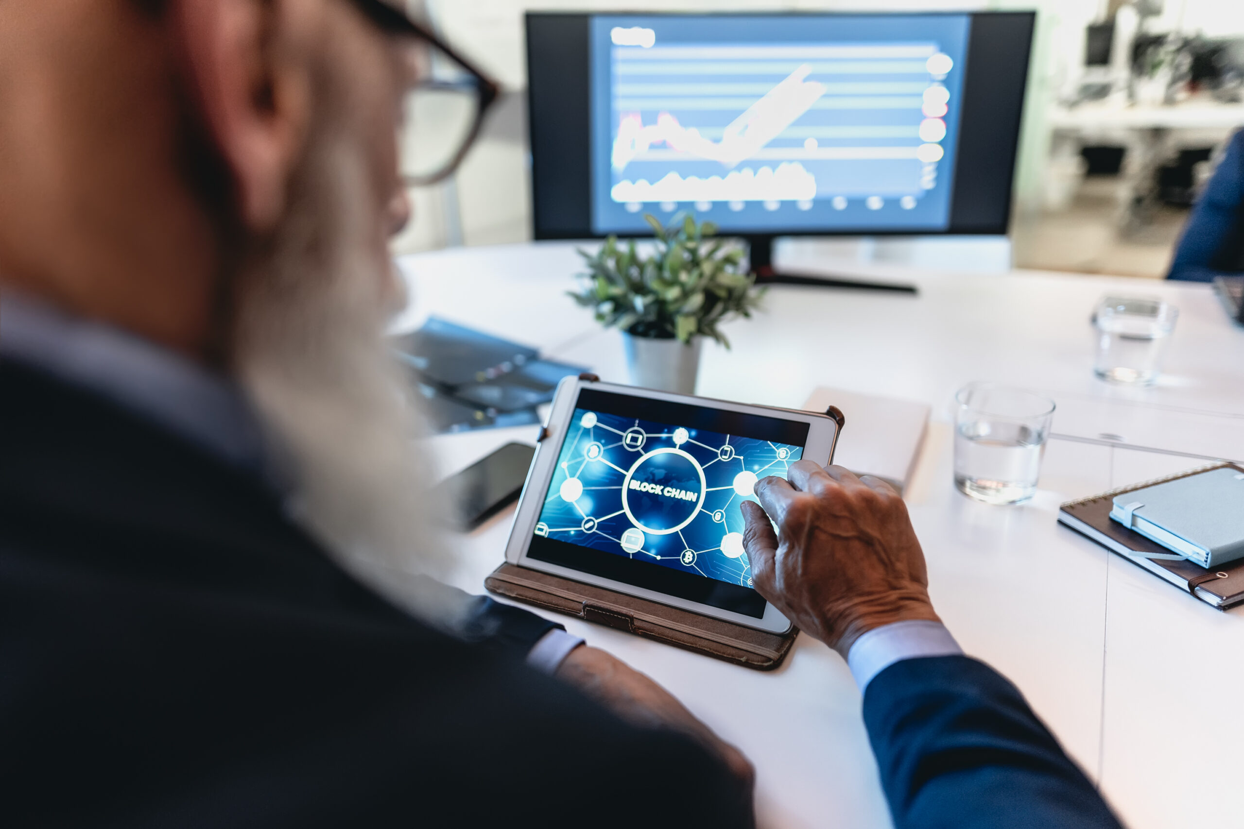 Business trader man working on crypto currency markets with bloc
